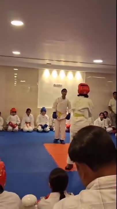Video of an in-house Karate sparring competition with students seated around the mat at Sports Zone LLP, Patna