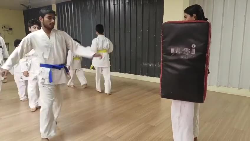 Video of Karate students practicing kicks on a striking pad at Sports Zone LLP, Patna