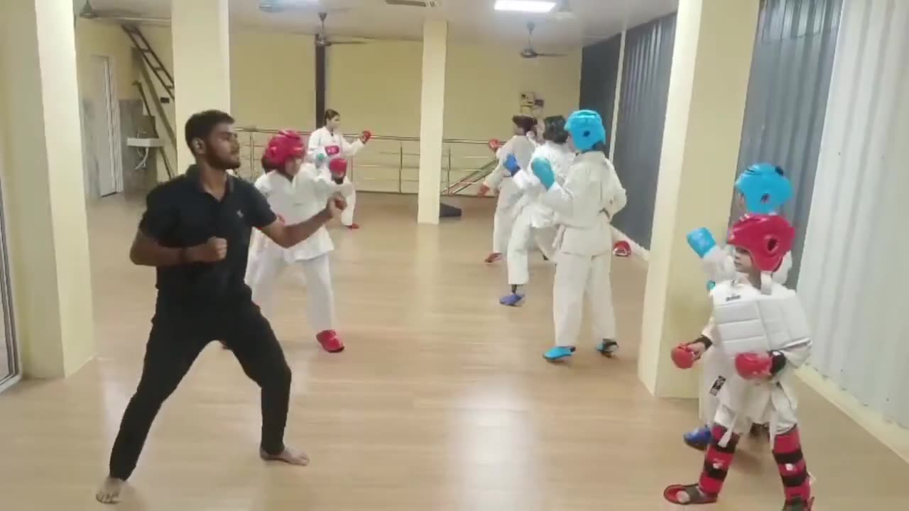 Video of Karate students practicing partner sparring drills in headgear at Sports Zone LLP, Patna
